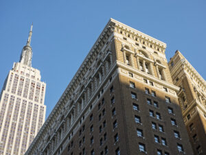 An image of the Empire state building seen from street level