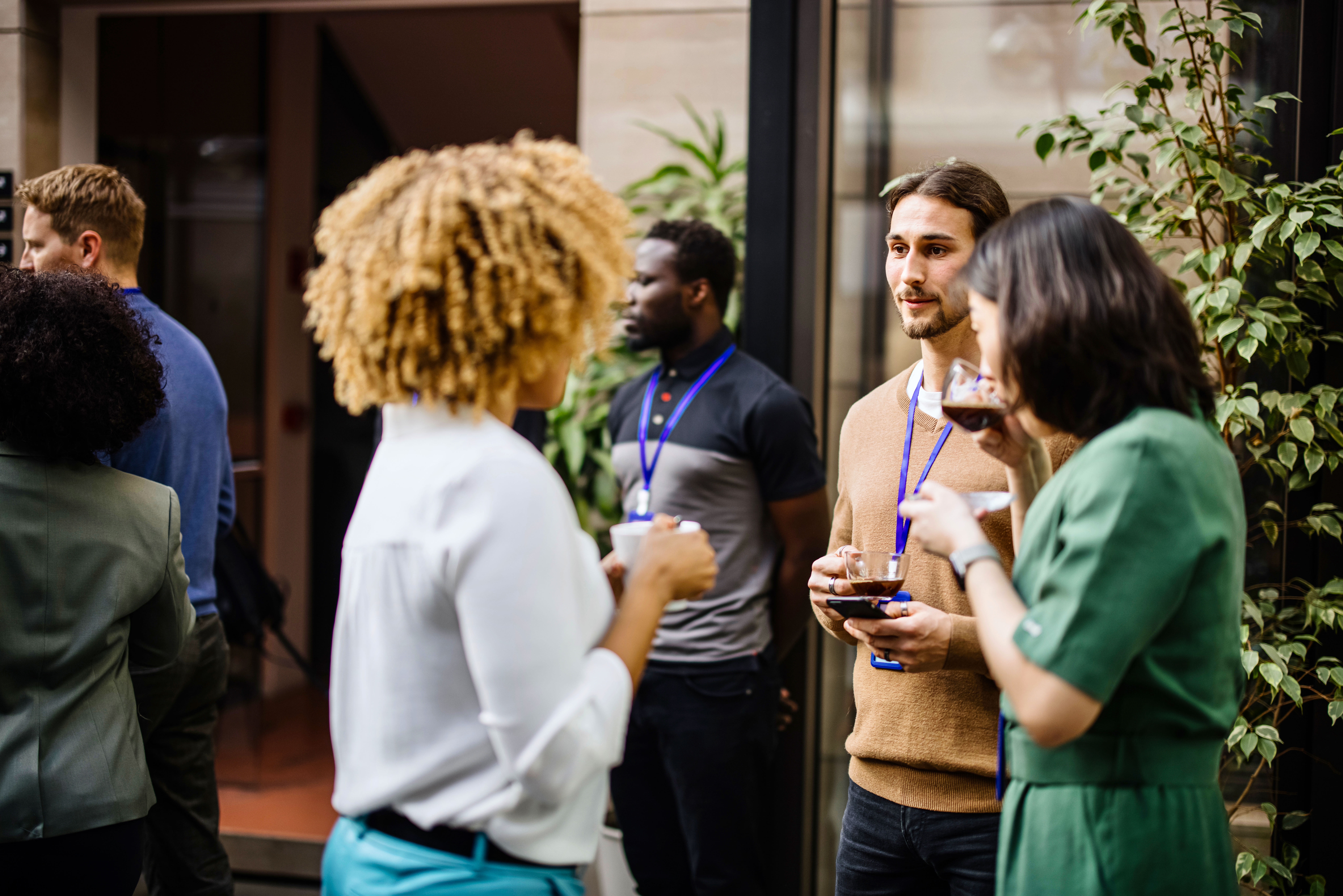 People networking over coffee