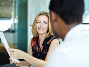 Shot of two businesspeople having a meeting in an office