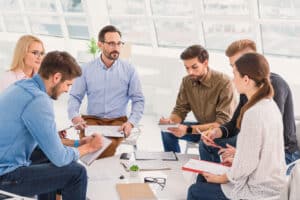 Group of people meeting around a table
