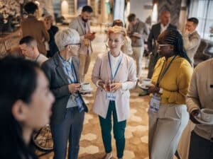 Group of people having a conversation at an event