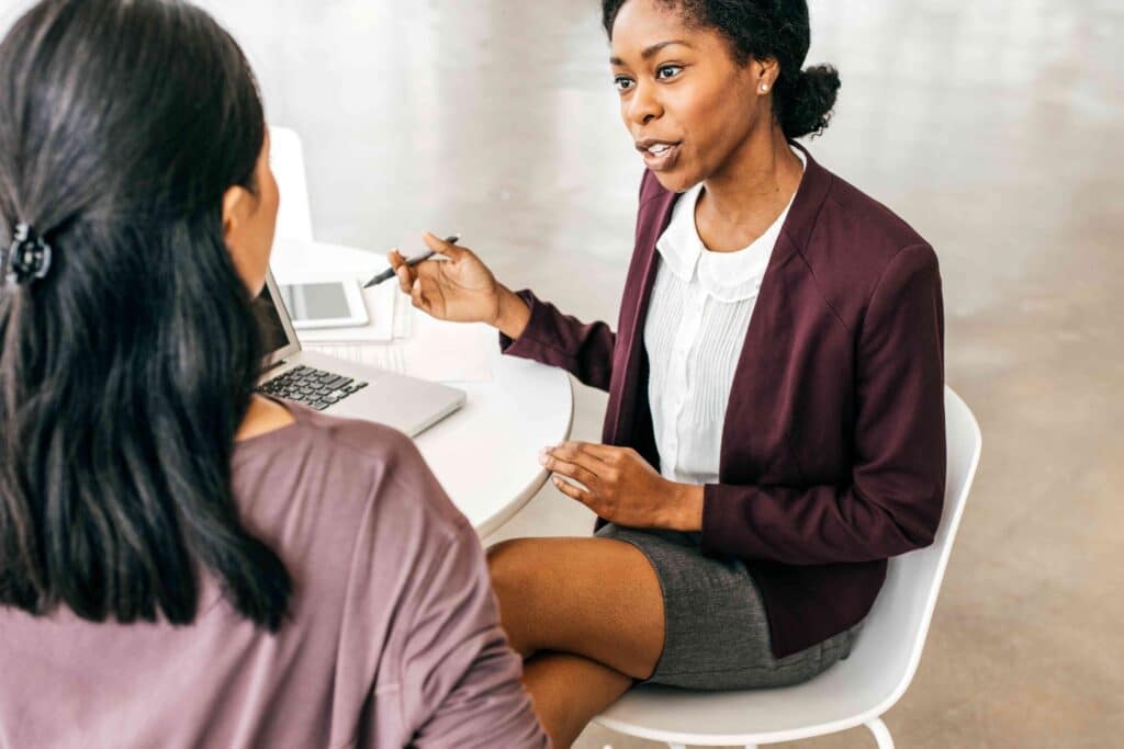 Two people in discussion